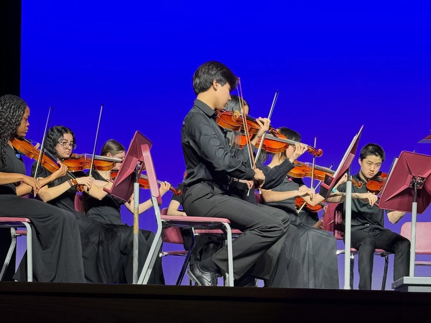 Munster orchestra performing on stage
